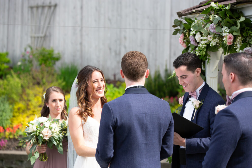 bride smiling during the wedding ceremony 