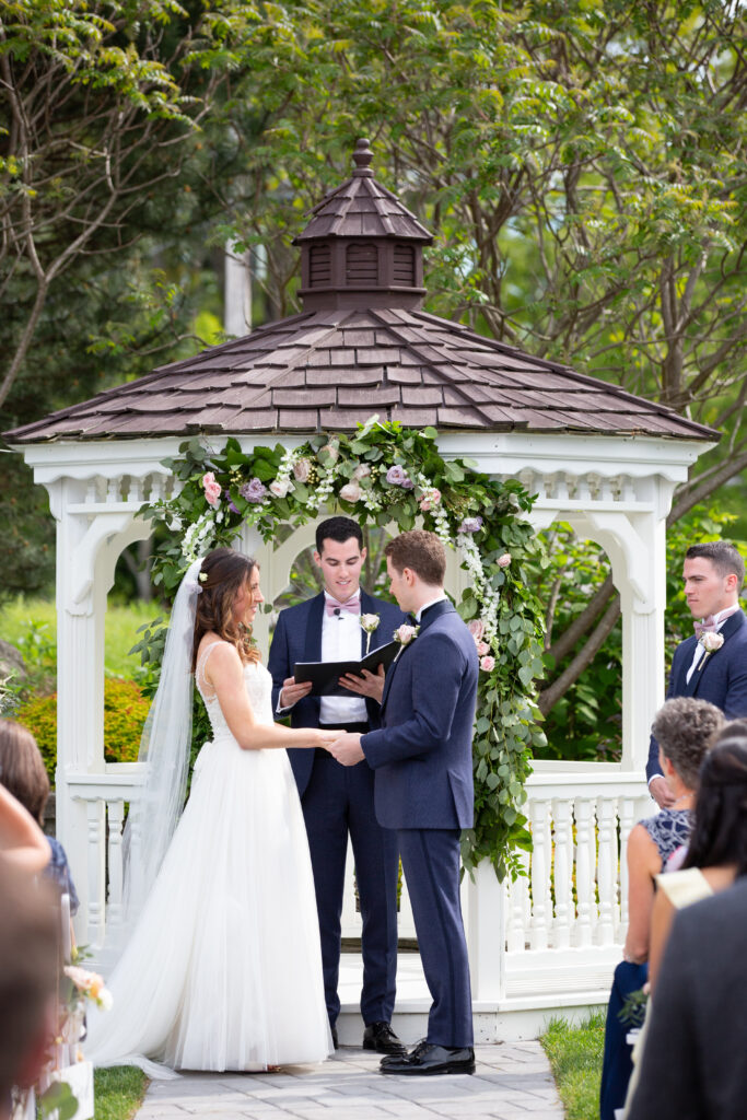 bride and groom at the alter