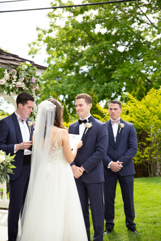 bride smiling during the wedding ceremony 