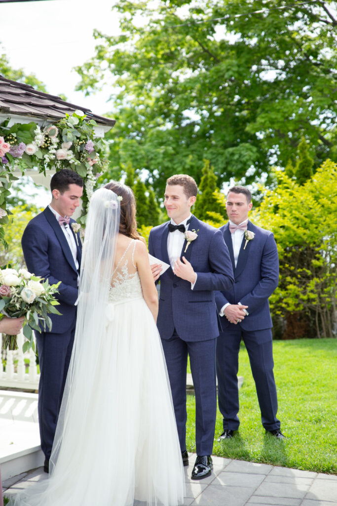 bride smiling during the wedding ceremony 