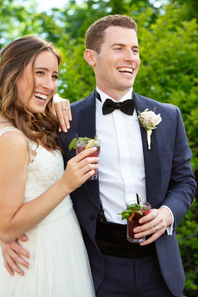 bride and groom laughing