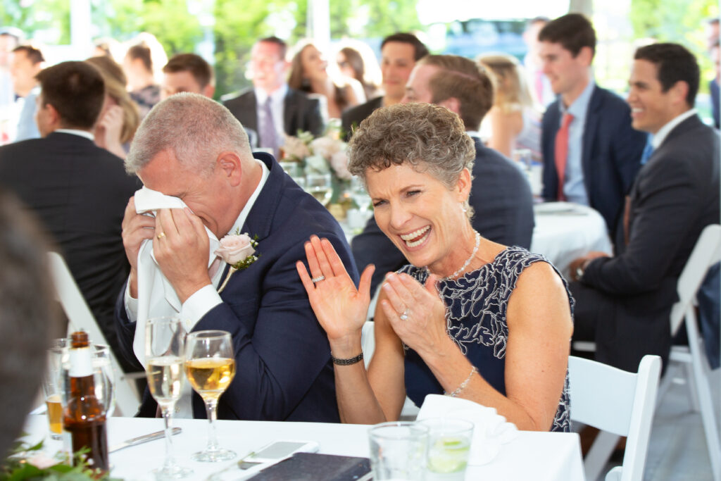 brides parents laughing