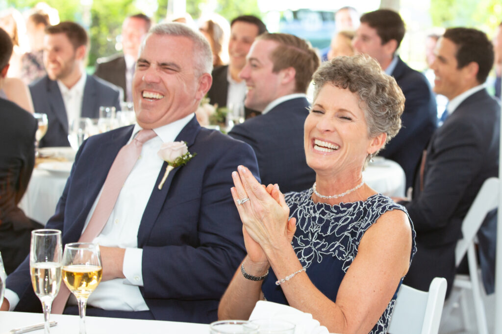 brides parents laughing