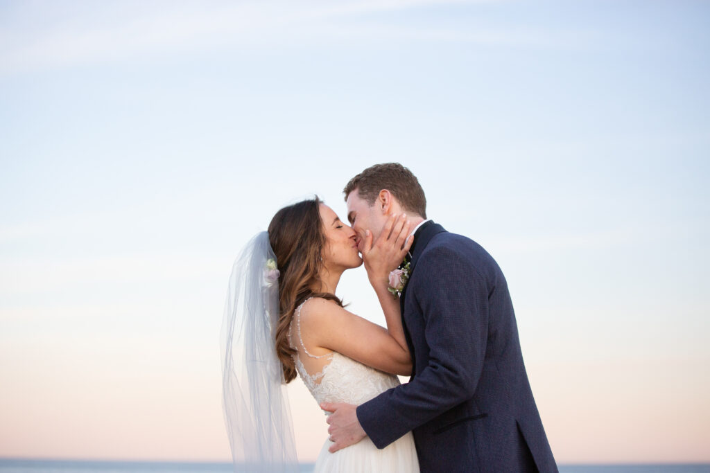 bride and groom kissing