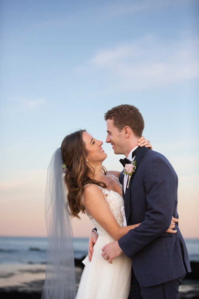 bride and groom looking at each other 