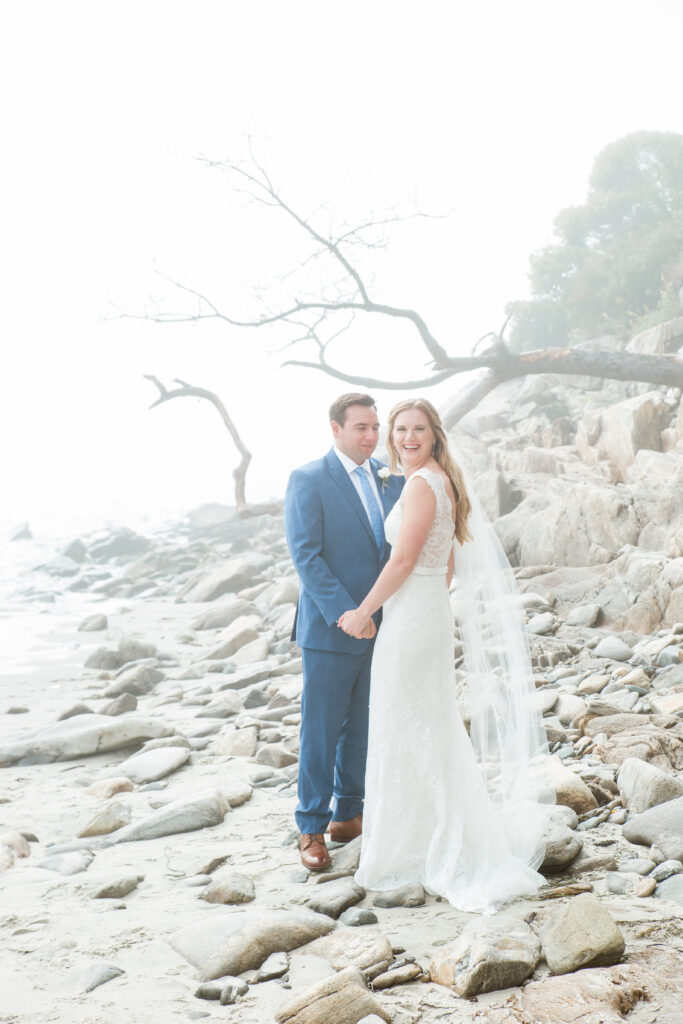 bride and groom on beach 