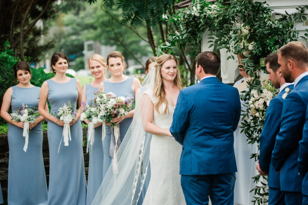 bride and groom looking at each other at wedding ceremony 