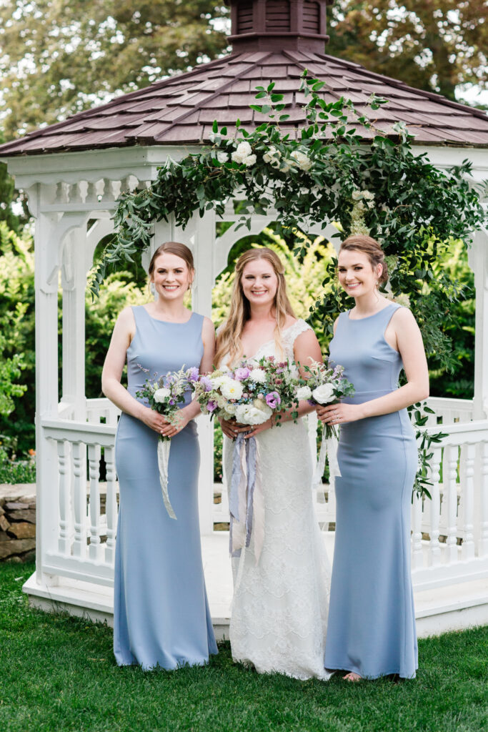 bride with her sisters