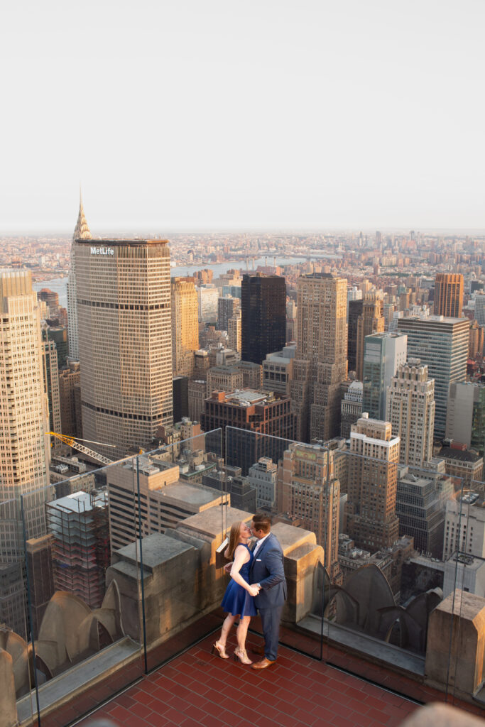 couple above the skyline in new york city 