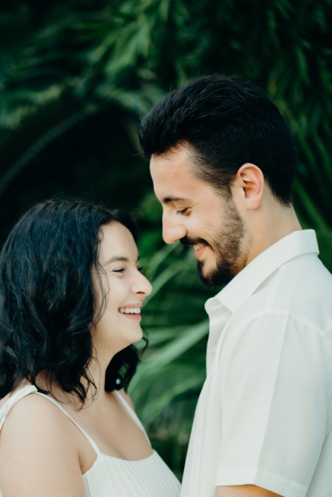 couple looking at each other and laughing 