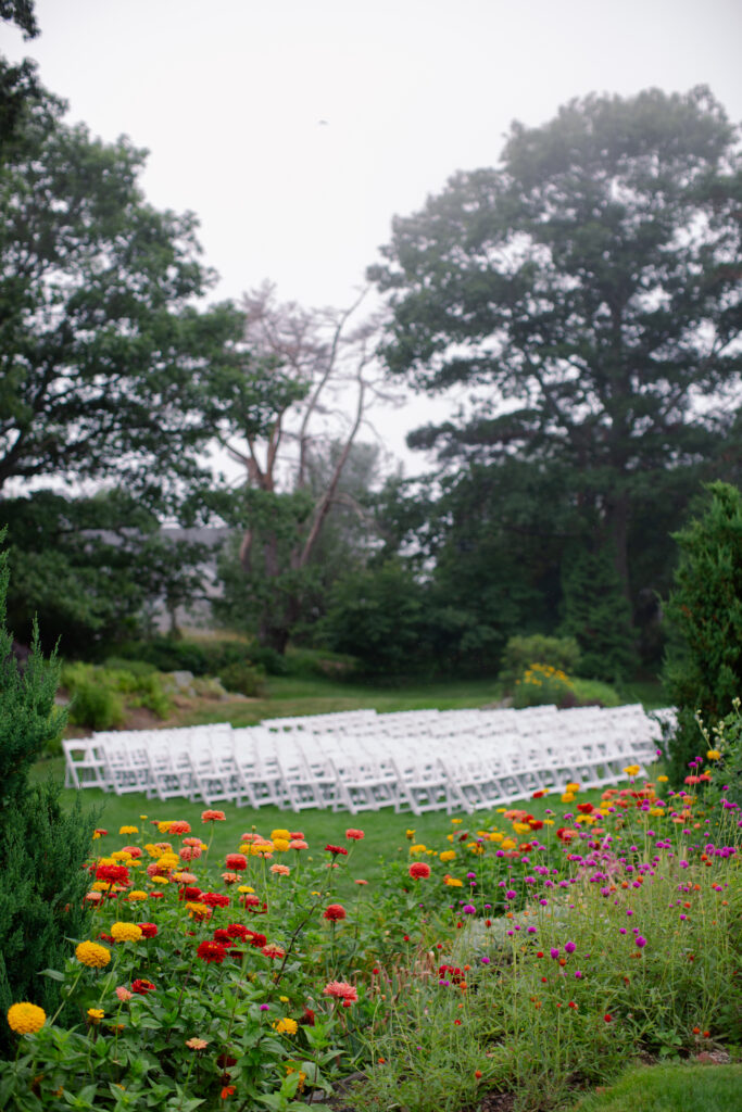 wedding chairs set in foggy garden 