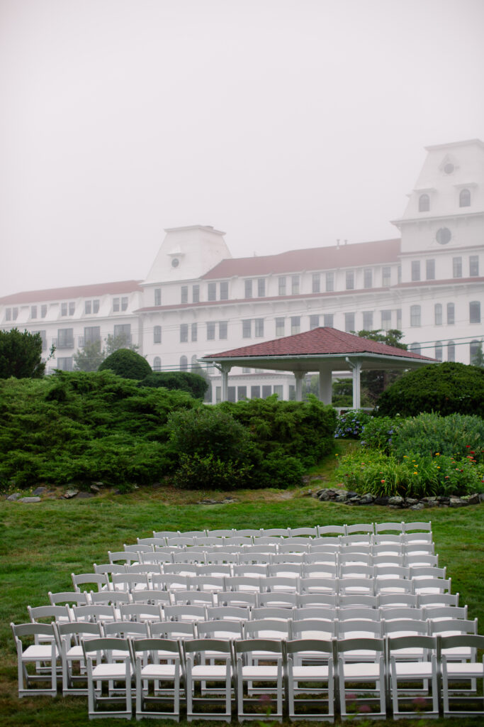 wedding chairs with the Wentworth by the Sea in the background