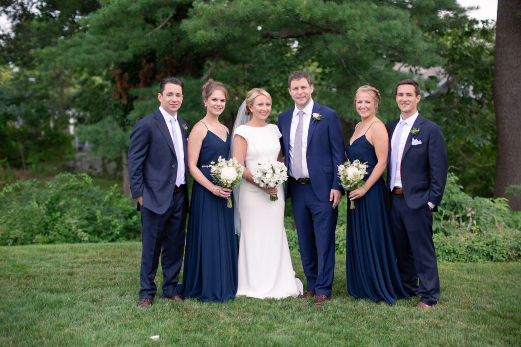 bride and her husband with their siblings and their spouses 