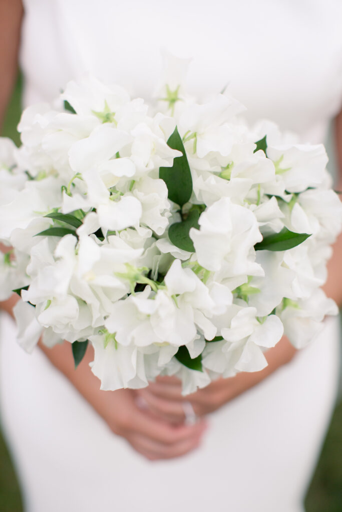 brides bouquet of white sweet peas