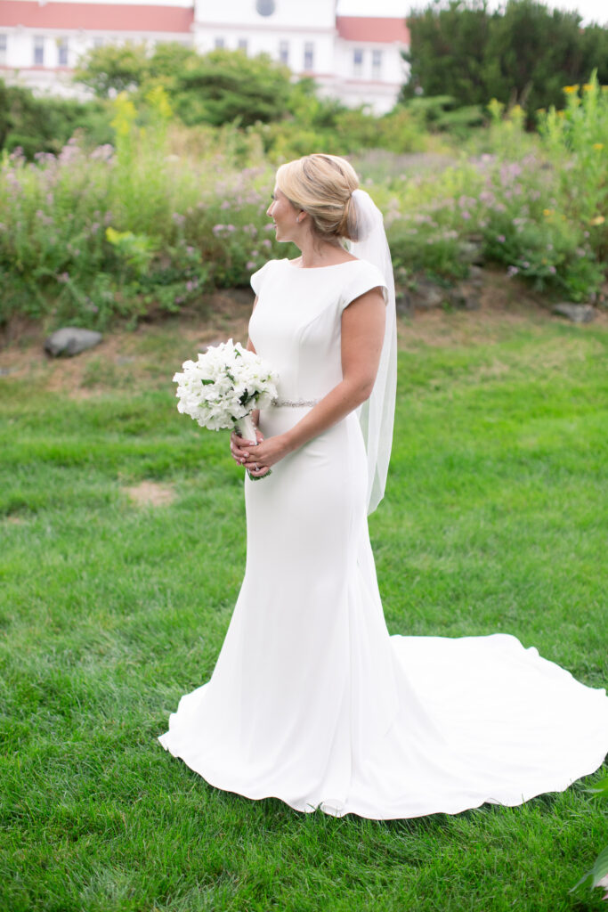 bride standing in the gardens 