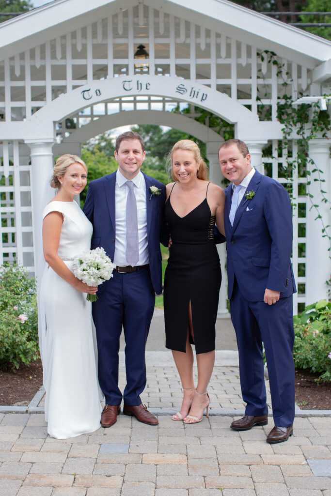 bride and groom with friends 