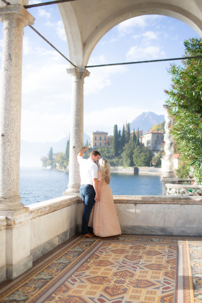 Couple standing in the gardens at Villa Monastero