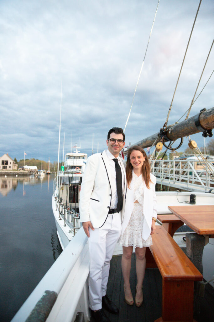 bride and groom on sailboats 