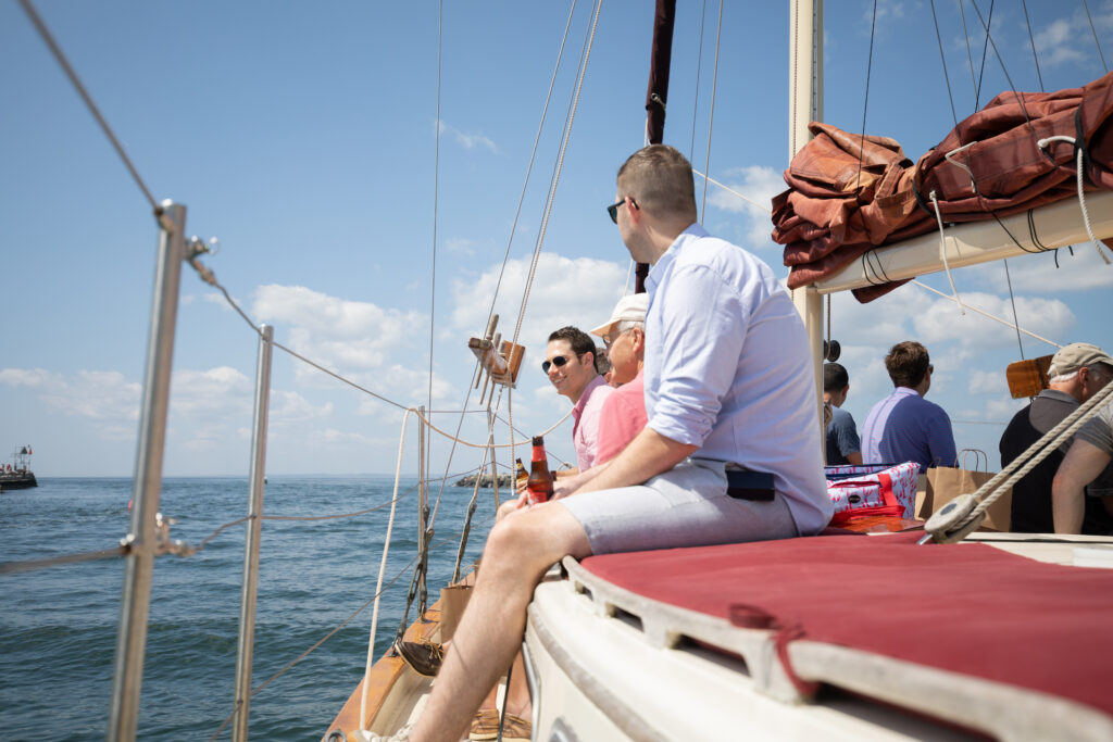 groomsmen on a sailboat