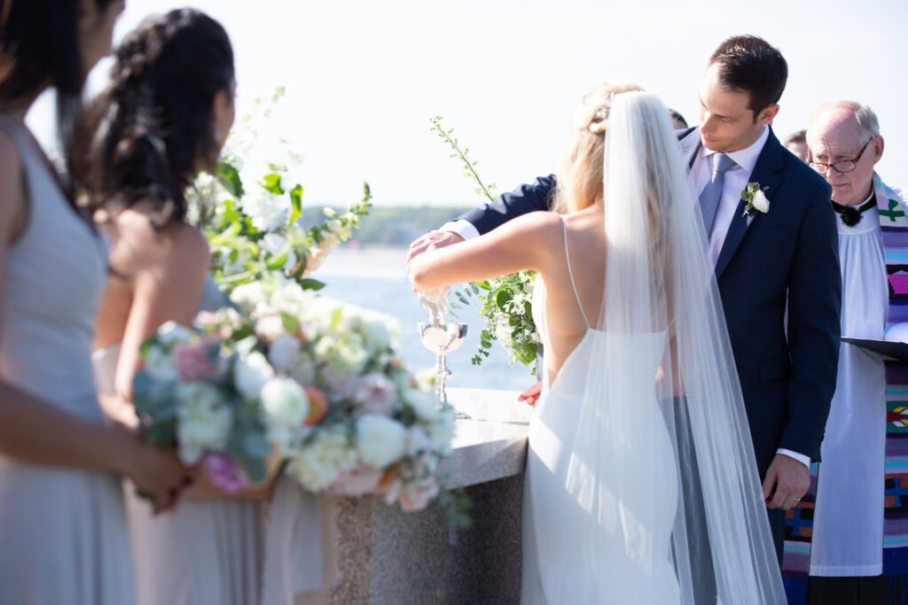 bride and groom doing a sand ceremony 