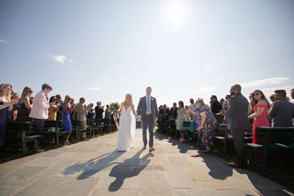 bride and groom leaving the ceremony together 