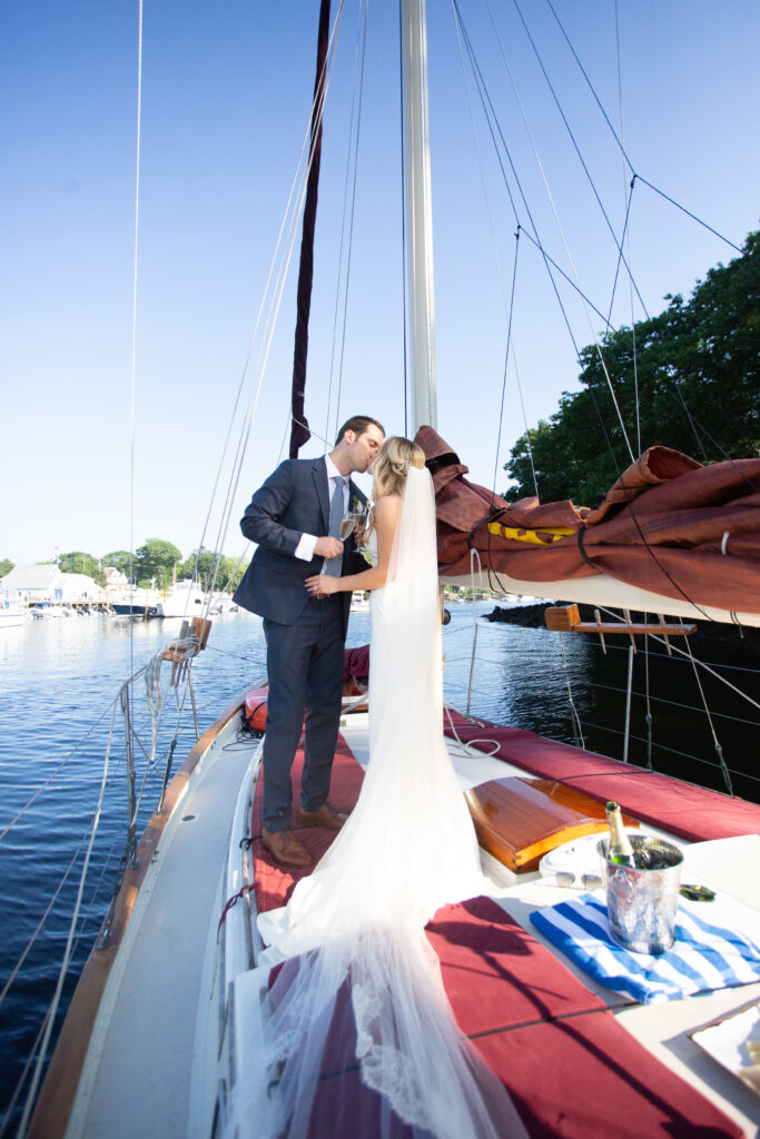 bride and groom on sailboat 