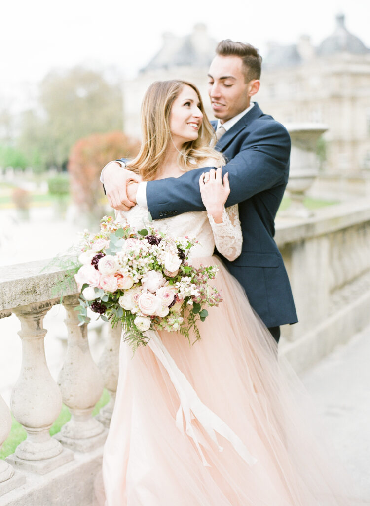 bride and groom laughing together 