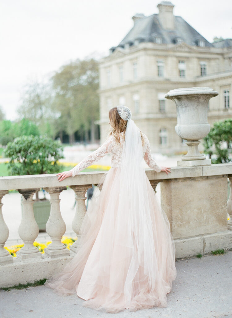 bride from the back wearing a cathedral veil