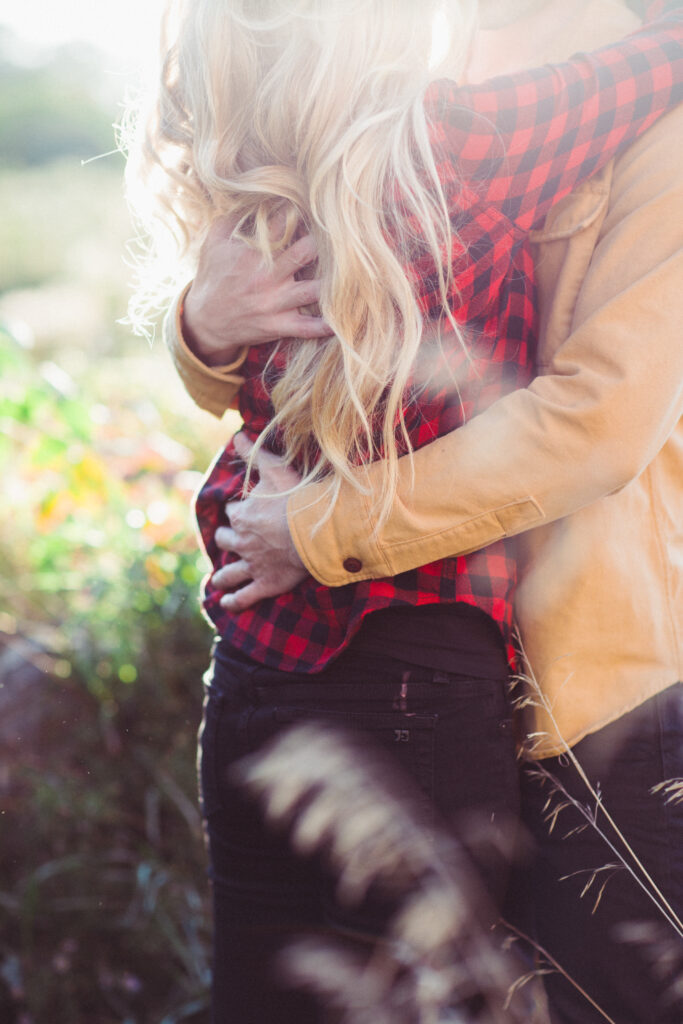 cropped image with couple holding each other 