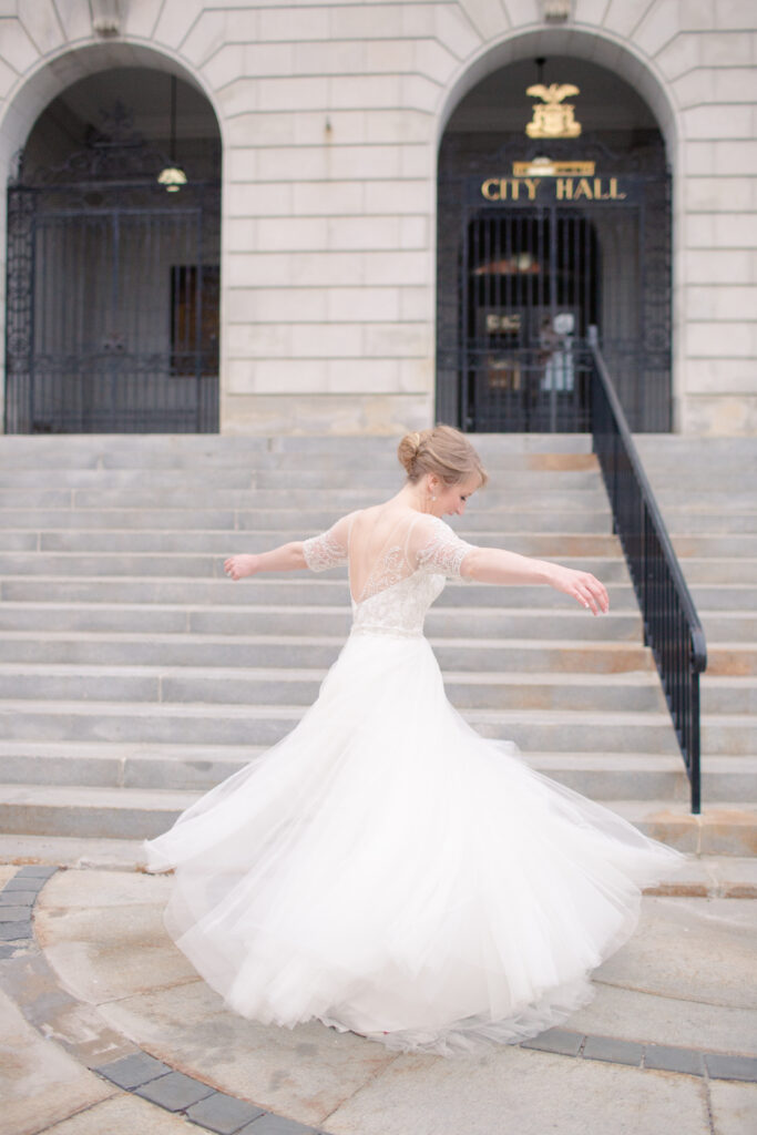 bride spinning in her gown 