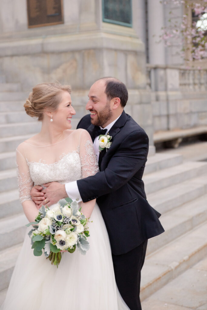 bride and groom together in hug