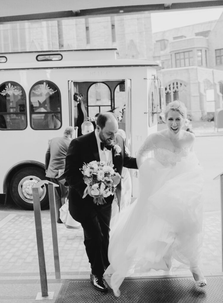 bride and groom arriving out of trolly 